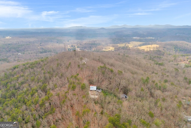 drone / aerial view featuring a mountain view