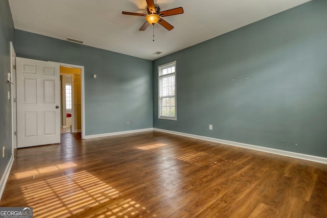 unfurnished room featuring hardwood / wood-style flooring and ceiling fan