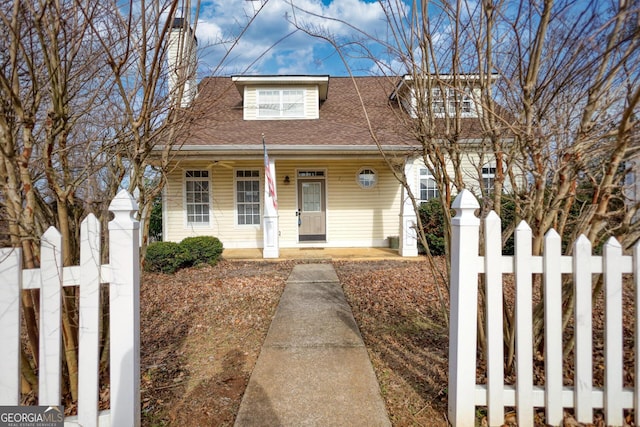 view of front of property featuring covered porch