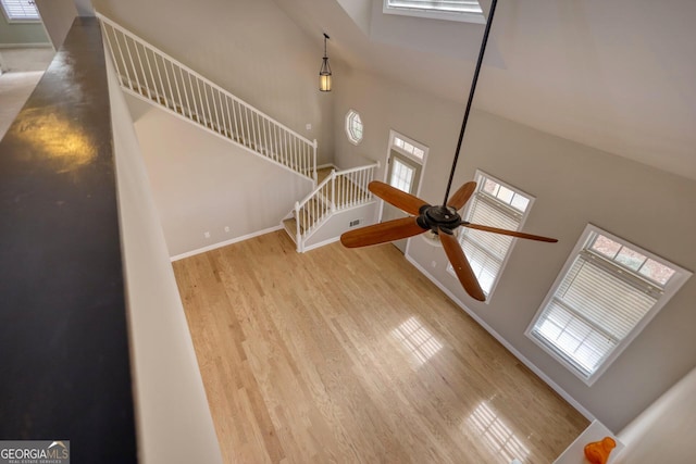 interior space featuring hardwood / wood-style floors and ceiling fan