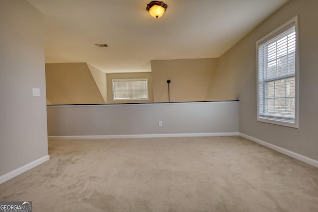 view of carpeted spare room