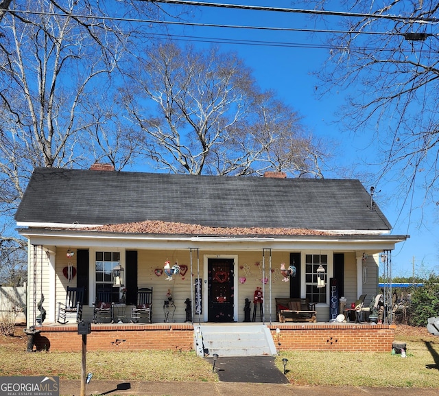 bungalow-style house featuring covered porch