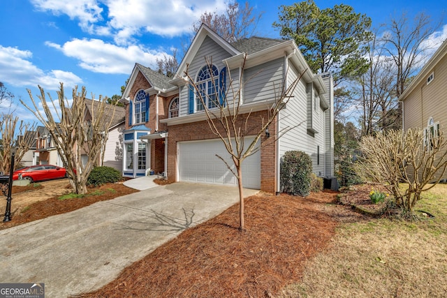 front of property with a garage