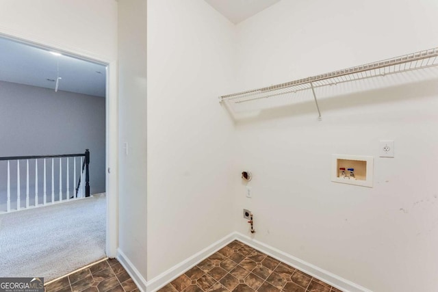 washroom featuring hookup for a gas dryer, electric dryer hookup, washer hookup, and dark carpet