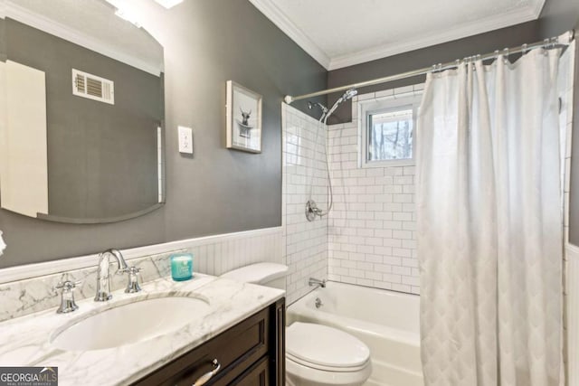 full bathroom featuring shower / bath combination with curtain, ornamental molding, toilet, and vanity