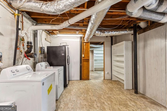 laundry room featuring washing machine and dryer