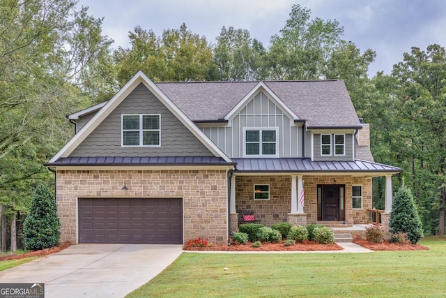 craftsman-style house featuring a garage, a front yard, and a porch