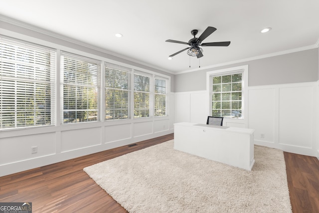 interior space featuring ornamental molding, dark hardwood / wood-style floors, and ceiling fan