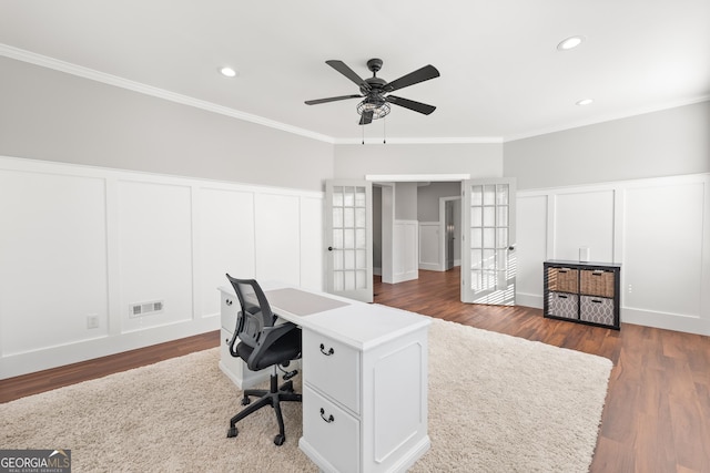 home office featuring french doors, ornamental molding, and dark hardwood / wood-style floors