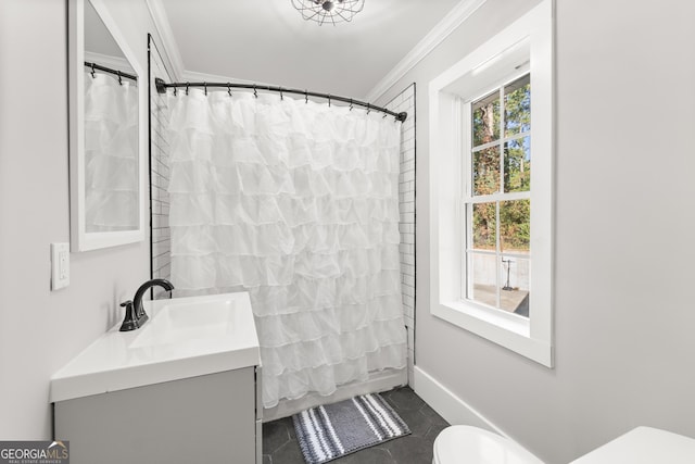 full bathroom featuring crown molding, tile patterned flooring, vanity, toilet, and shower / bath combo with shower curtain