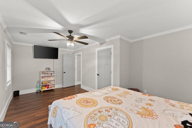 bedroom featuring ceiling fan, ornamental molding, and dark hardwood / wood-style floors