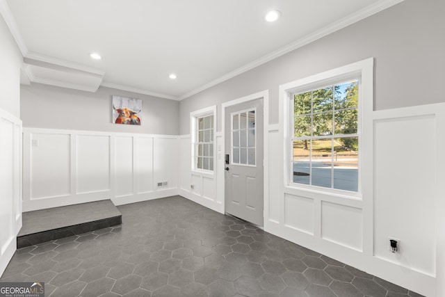 entryway featuring crown molding