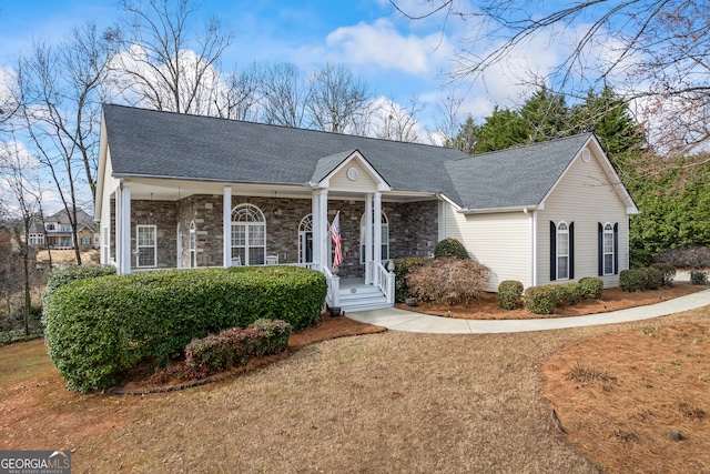 single story home featuring a front yard