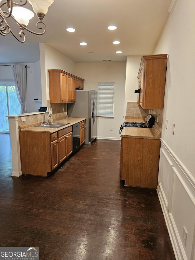 2764 Keystone Ave, Lithonia, GA 30058 - kitchen featuring a sink, dishwasher, light countertops, decorative backsplash, and recessed lighting