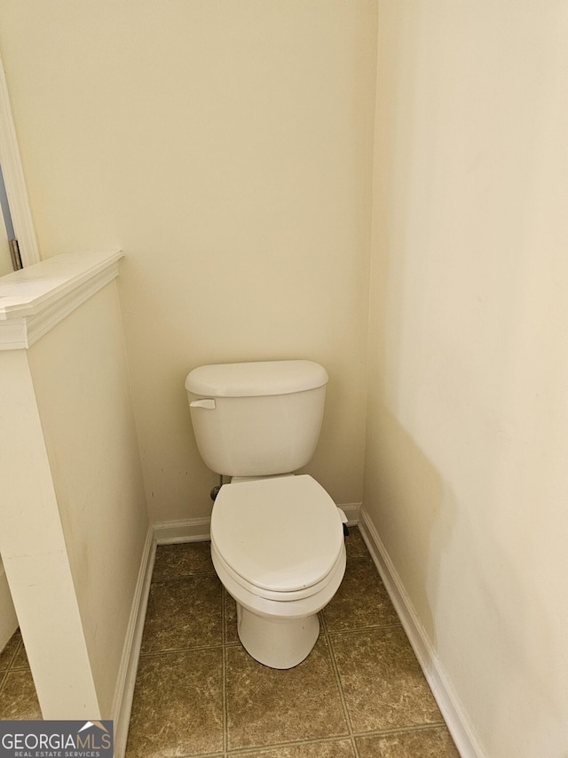 2764 Keystone Ave, Lithonia, GA 30058 - bathroom featuring toilet and baseboards