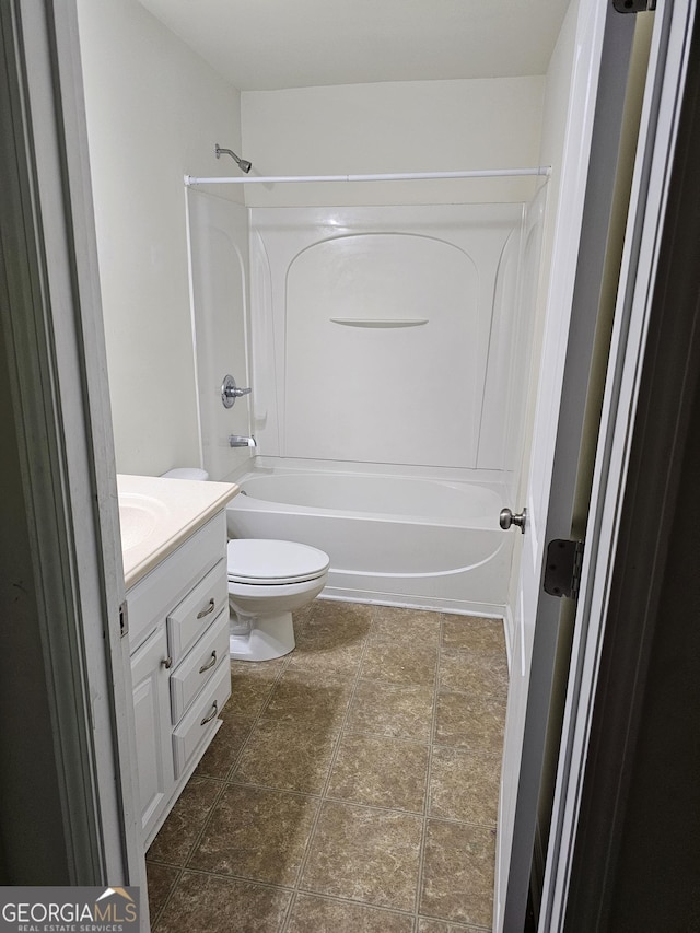 2764 Keystone Ave, Lithonia, GA 30058 - full bathroom featuring toilet, tub / shower combination, and vanity
