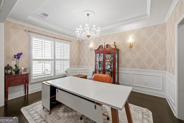 office area with an inviting chandelier, dark wood-type flooring, and ornamental molding