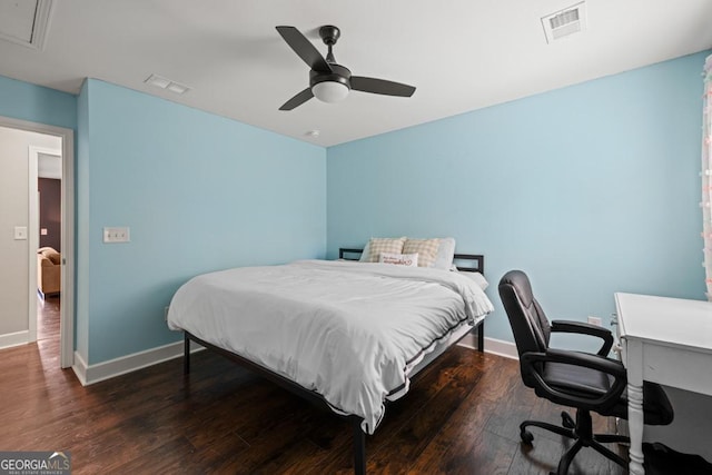 bedroom featuring dark hardwood / wood-style floors and ceiling fan