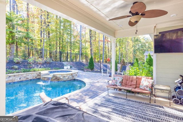 view of pool featuring an outdoor living space, an in ground hot tub, ceiling fan, and a patio area