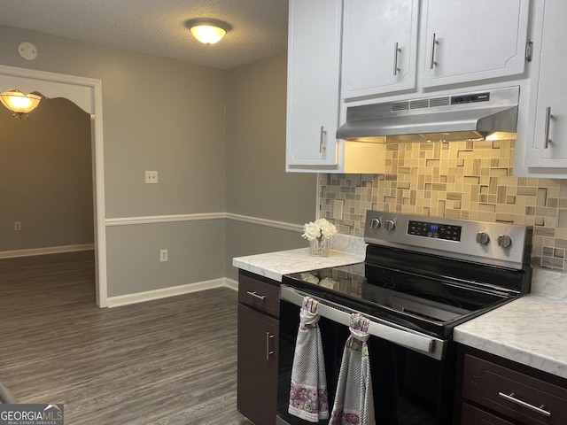 260 Edgewater Dr, Macon, GA 31220 - kitchen featuring stainless steel electric range oven, under cabinet range hood, tasteful backsplash, light countertops, and white cabinets