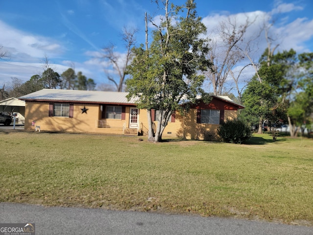 single story home featuring a front lawn