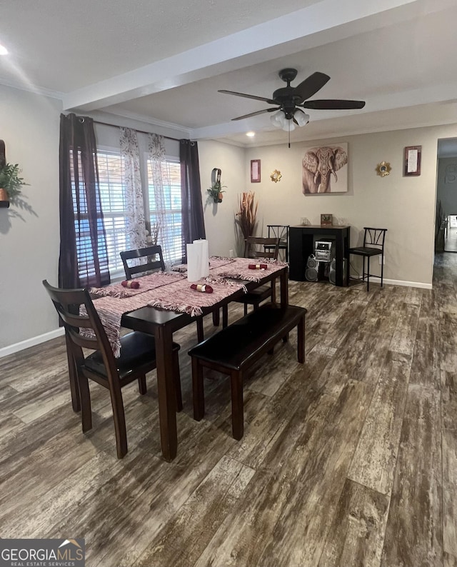 dining room featuring ceiling fan, ornamental molding, and dark hardwood / wood-style floors