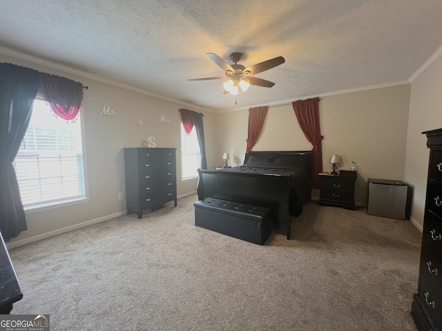 carpeted bedroom featuring crown molding, ceiling fan, and a textured ceiling