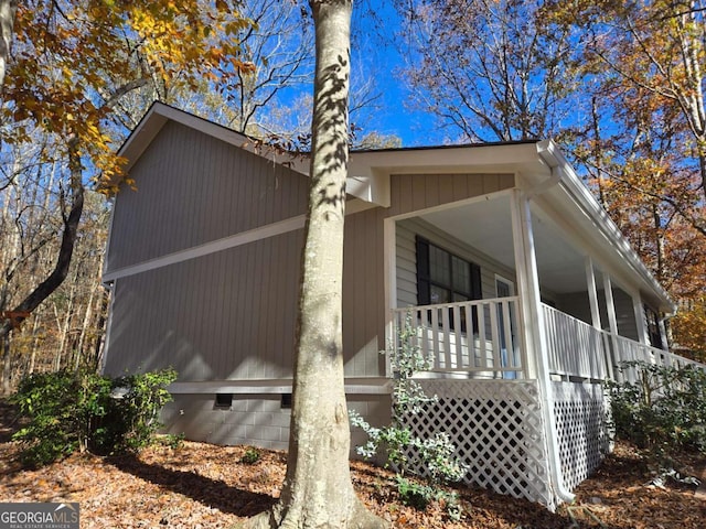 view of home's exterior featuring covered porch