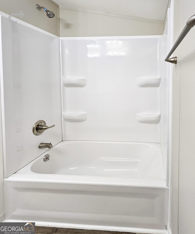 bathroom featuring bathing tub / shower combination