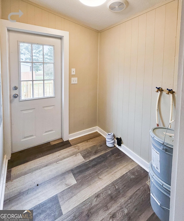 entryway featuring dark hardwood / wood-style floors