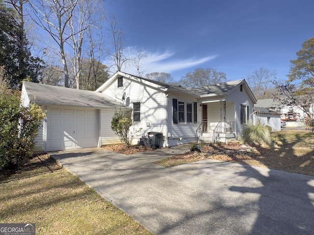 view of front of home with a garage and a porch