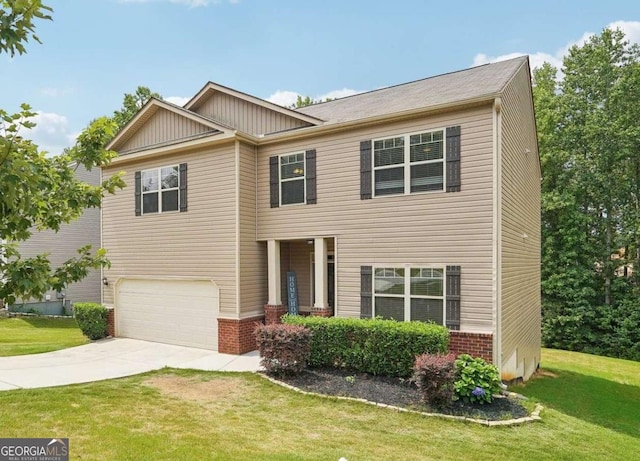 view of front of property featuring a garage and a front lawn