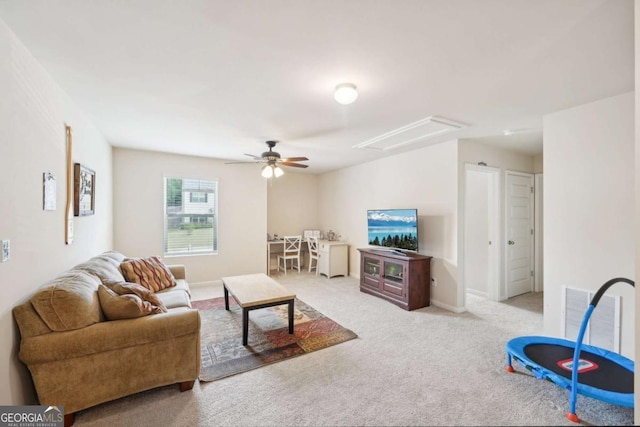 living room featuring ceiling fan and light carpet