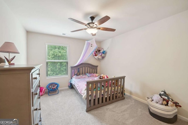 carpeted bedroom featuring ceiling fan