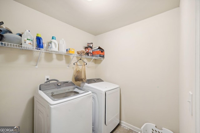 laundry room with washer and dryer