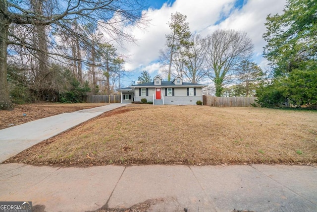 ranch-style house featuring a front lawn