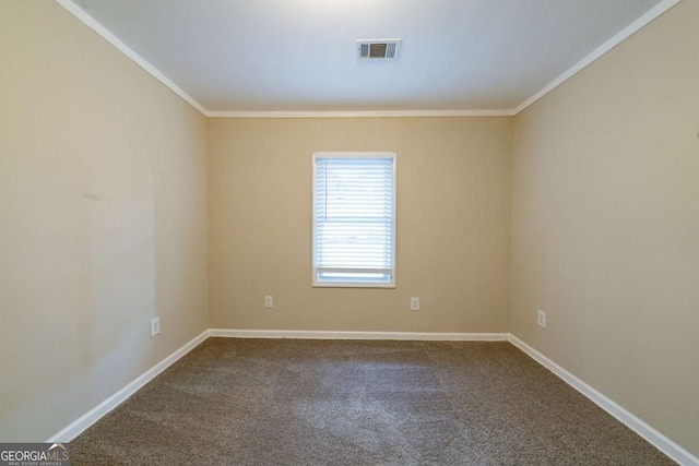 carpeted empty room with crown molding