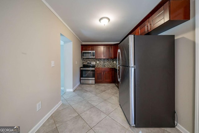 kitchen featuring stainless steel appliances, crown molding, light tile patterned flooring, and decorative backsplash