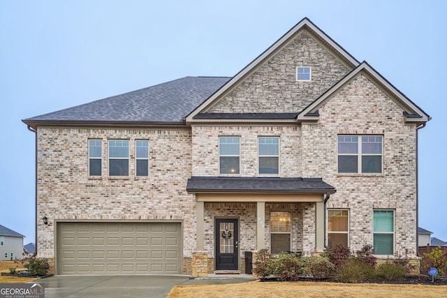 view of front of home with a garage