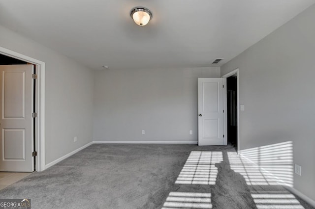 view of carpeted spare room