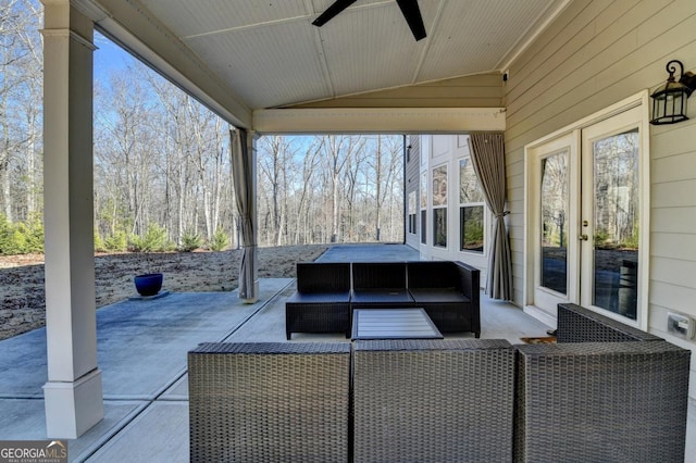 view of patio / terrace featuring an outdoor hangout area, ceiling fan, and french doors