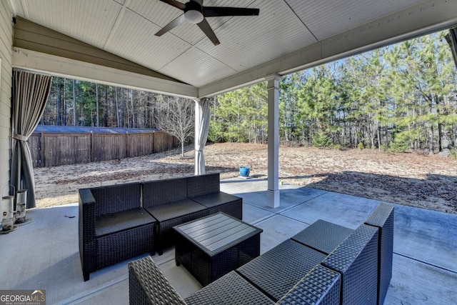 view of patio featuring an outdoor living space and ceiling fan