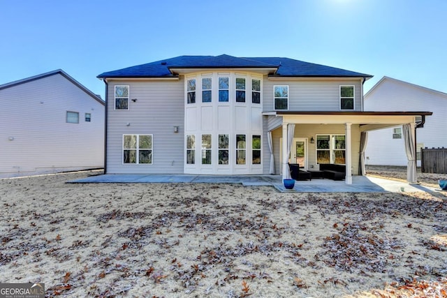 back of house featuring a patio