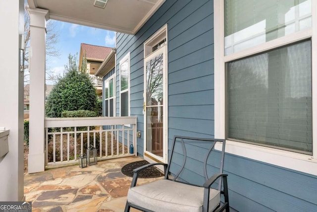 balcony featuring a porch