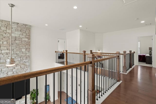 corridor featuring dark hardwood / wood-style floors