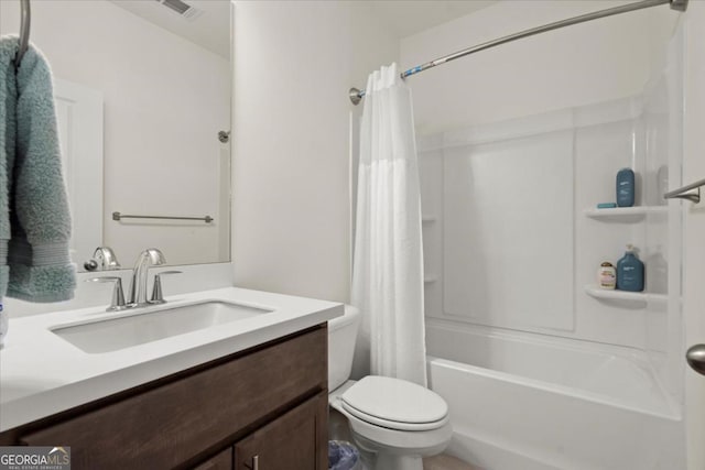 full bathroom with vanity, toilet, and shower / bath combo