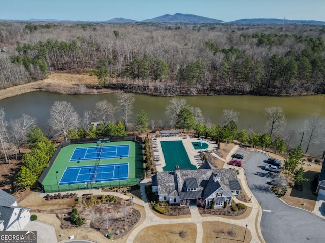 aerial view featuring a water and mountain view