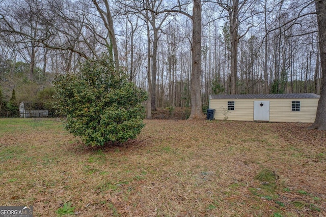 view of yard with a storage shed