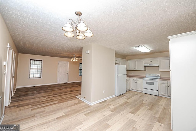 kitchen with white cabinetry, white appliances, decorative light fixtures, and light hardwood / wood-style floors