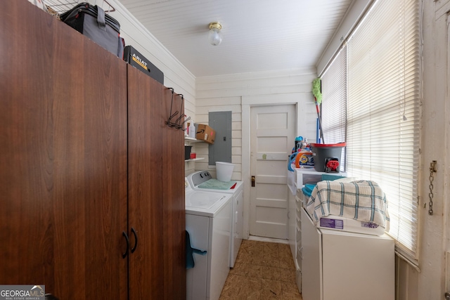 washroom featuring washing machine and dryer and electric panel